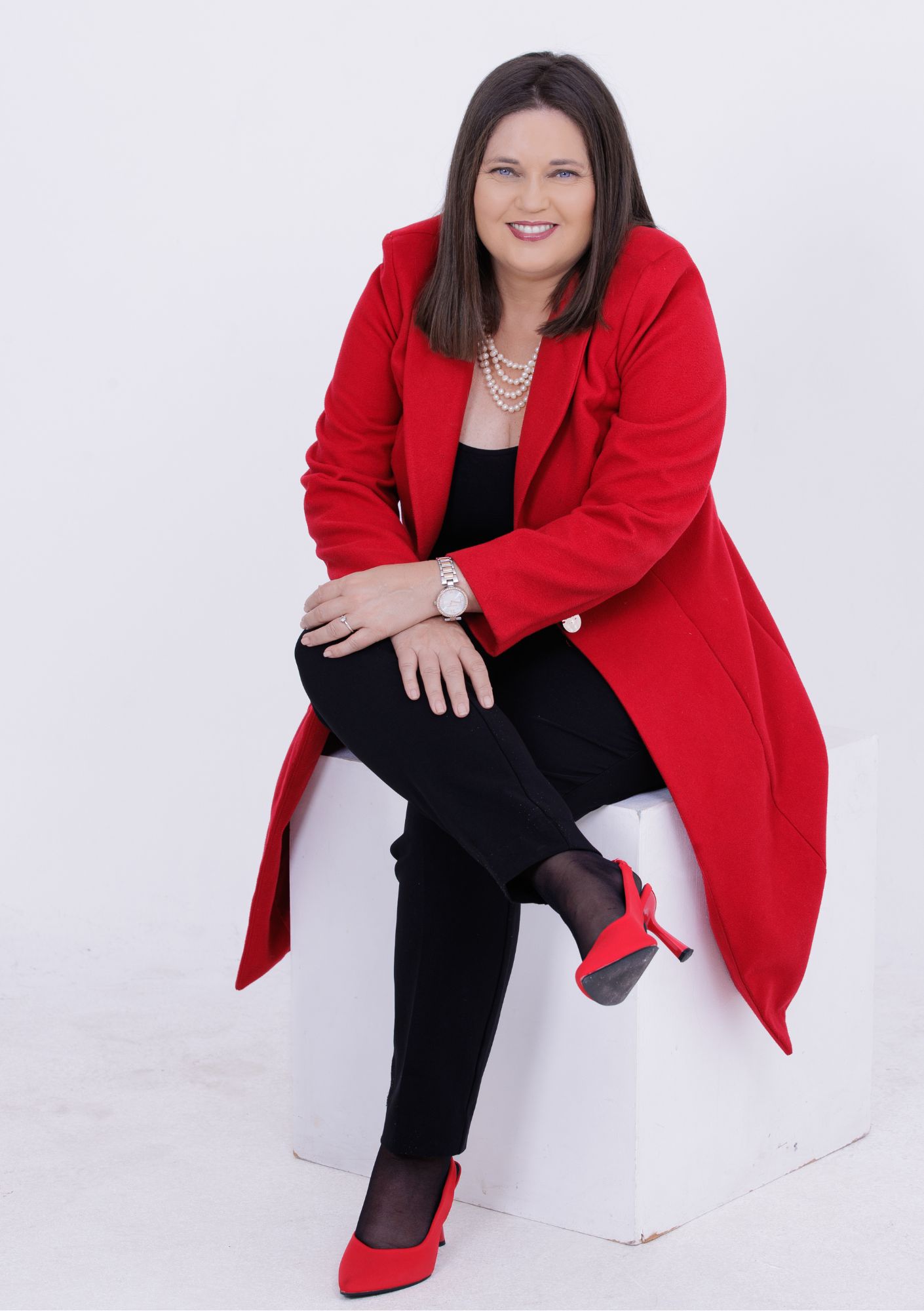 Kim Vermaak Author Book Coach Speaker Red Jacket and Shoes